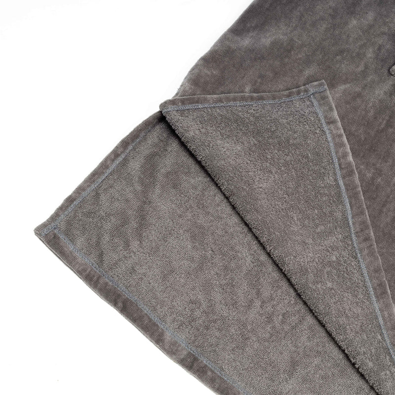 Interior poncho toalla