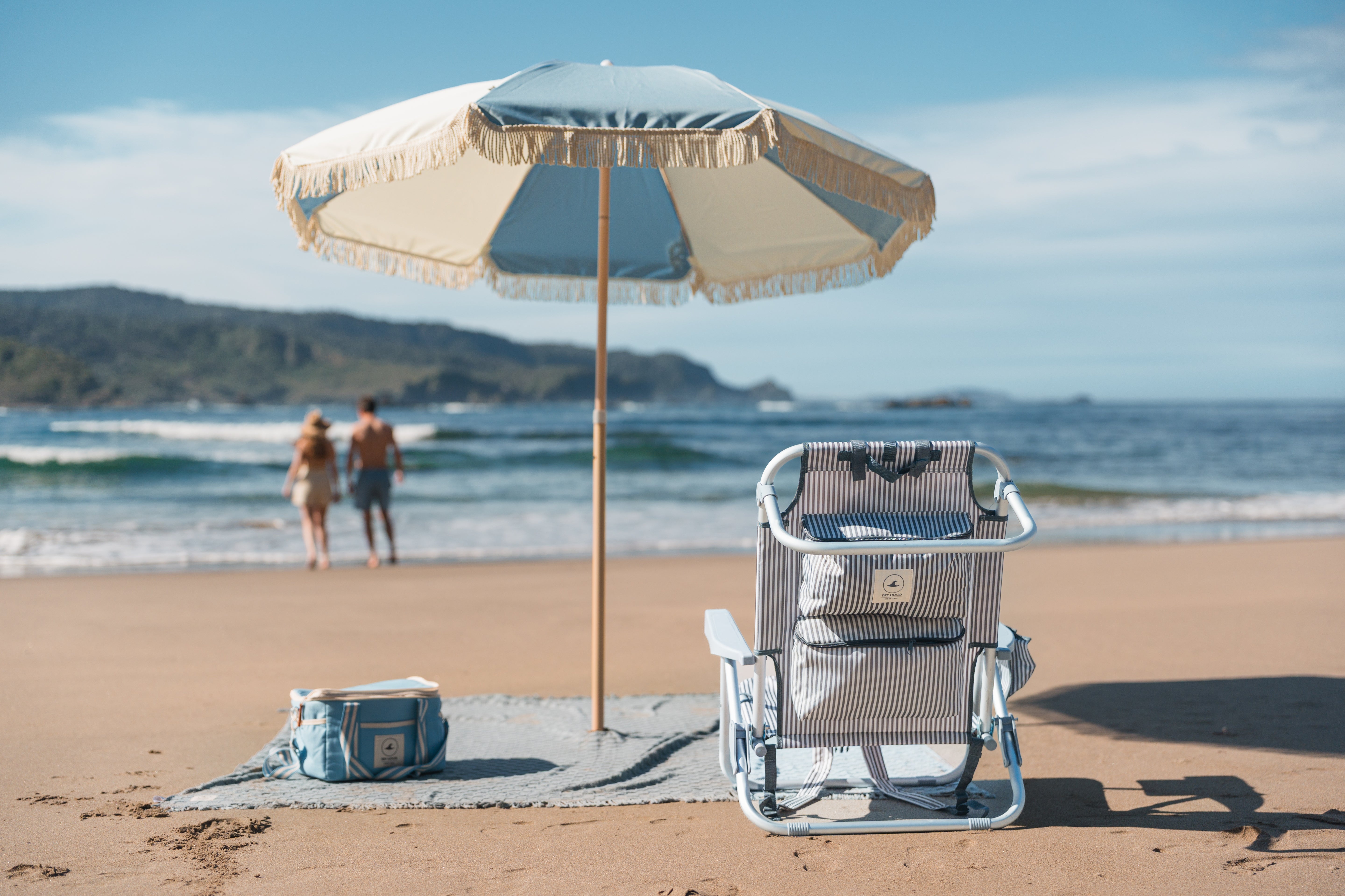 quitasol de playa con flecos