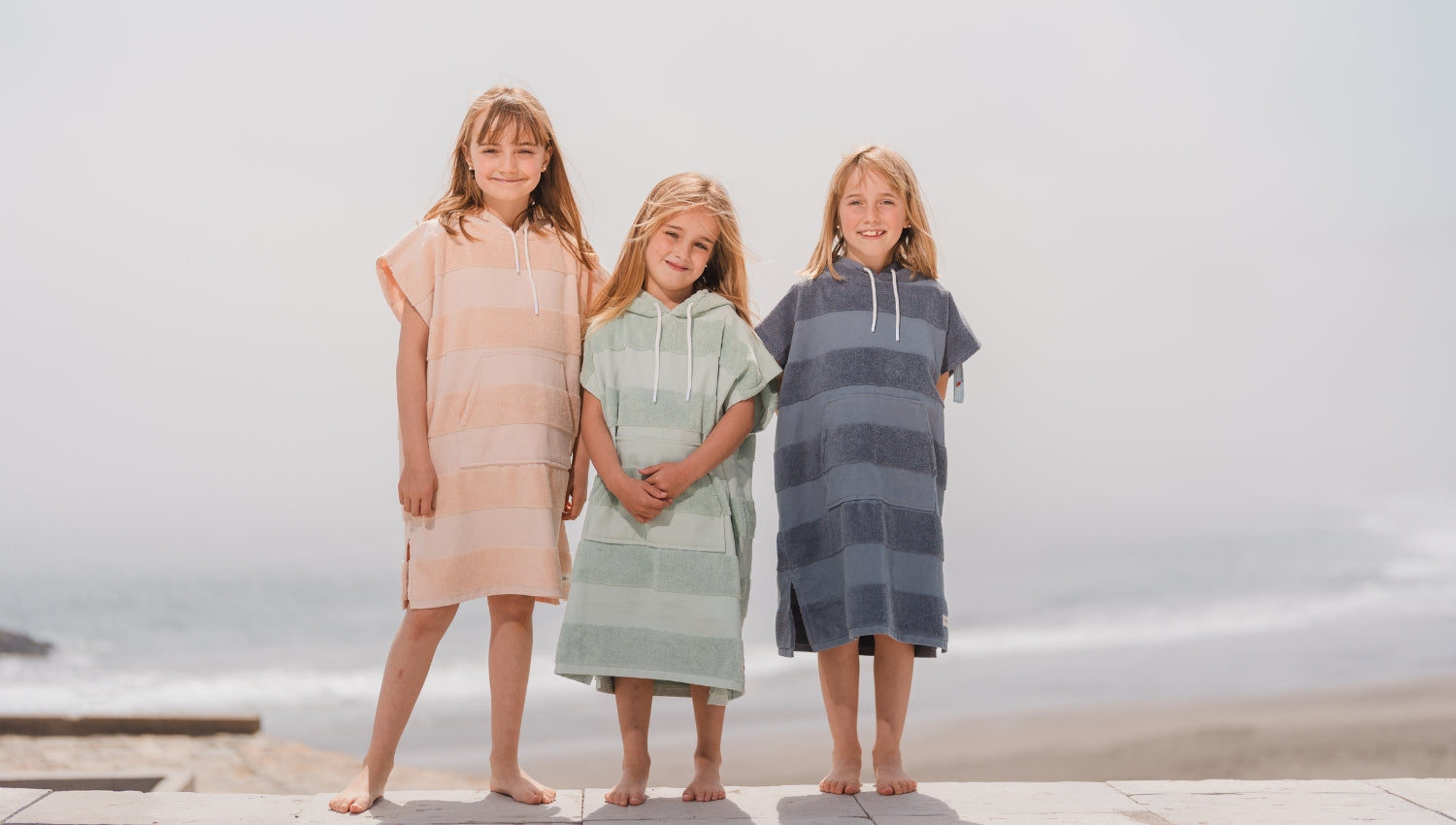 ponchos de toalla para niños sunshine